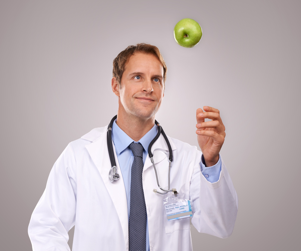 arts jongleert met appel - praktijkhandleiding huisarts